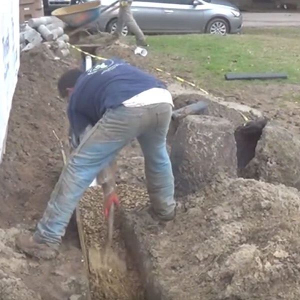 worker digging the soil
